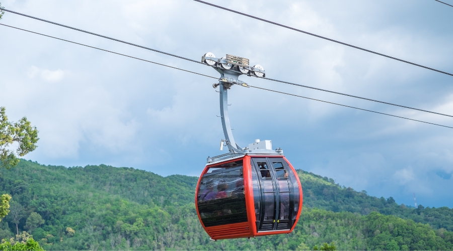 Langkawi cable cars ascending Mount Mat Cincang with lush rainforest scenery below